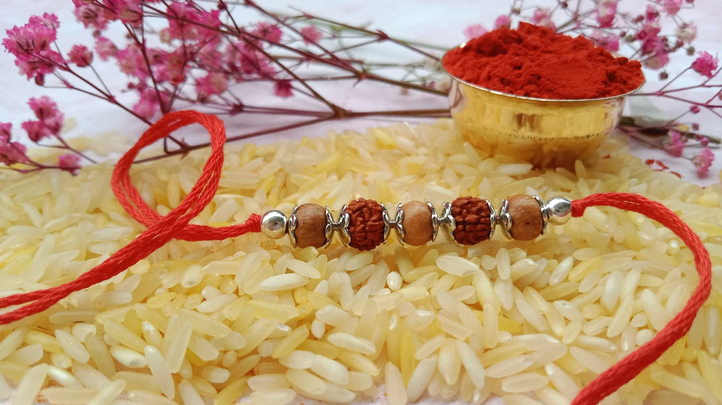 Silver Rudraksh Rakhi with Red Thread - Shield of Love