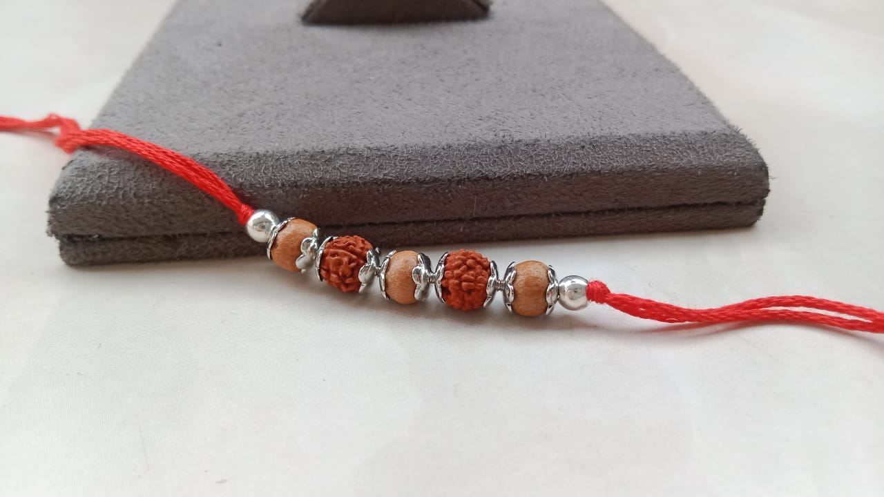 Silver Rudraksh Rakhi with Red Thread - Shield of Love