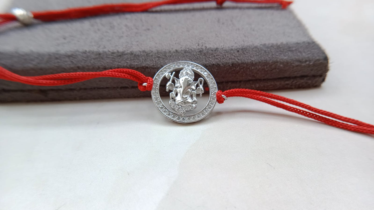 Silver Ganpati Rakhi with Red Thread