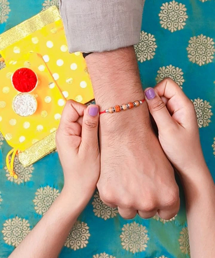 Silver Rudraksh Rakhi with Red Thread - Shield of Love