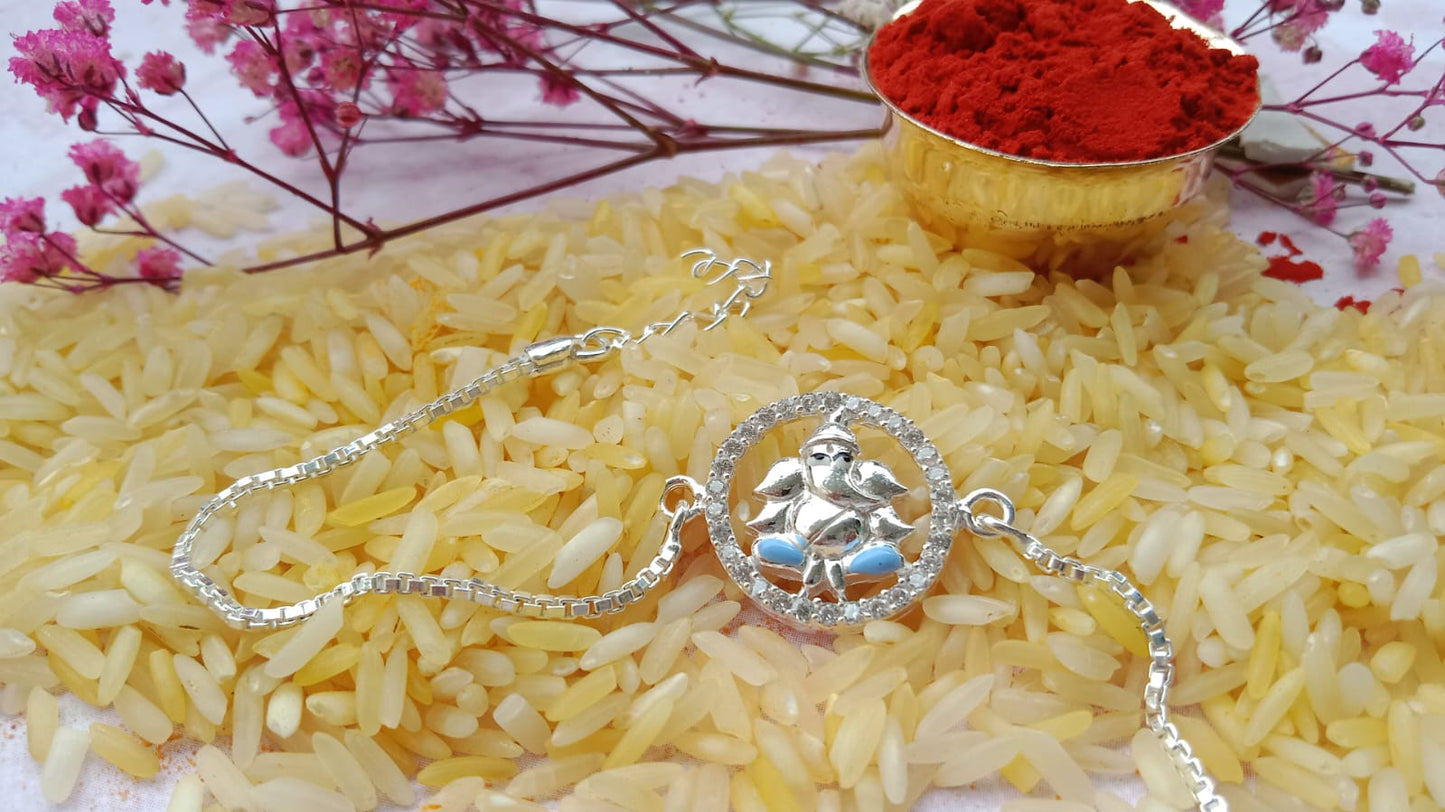 925 Silver Auspicious Ganesha ( ᬒᬁ ) Bracelet Rakhi with Blue Enamel and adjustable Silver chain
