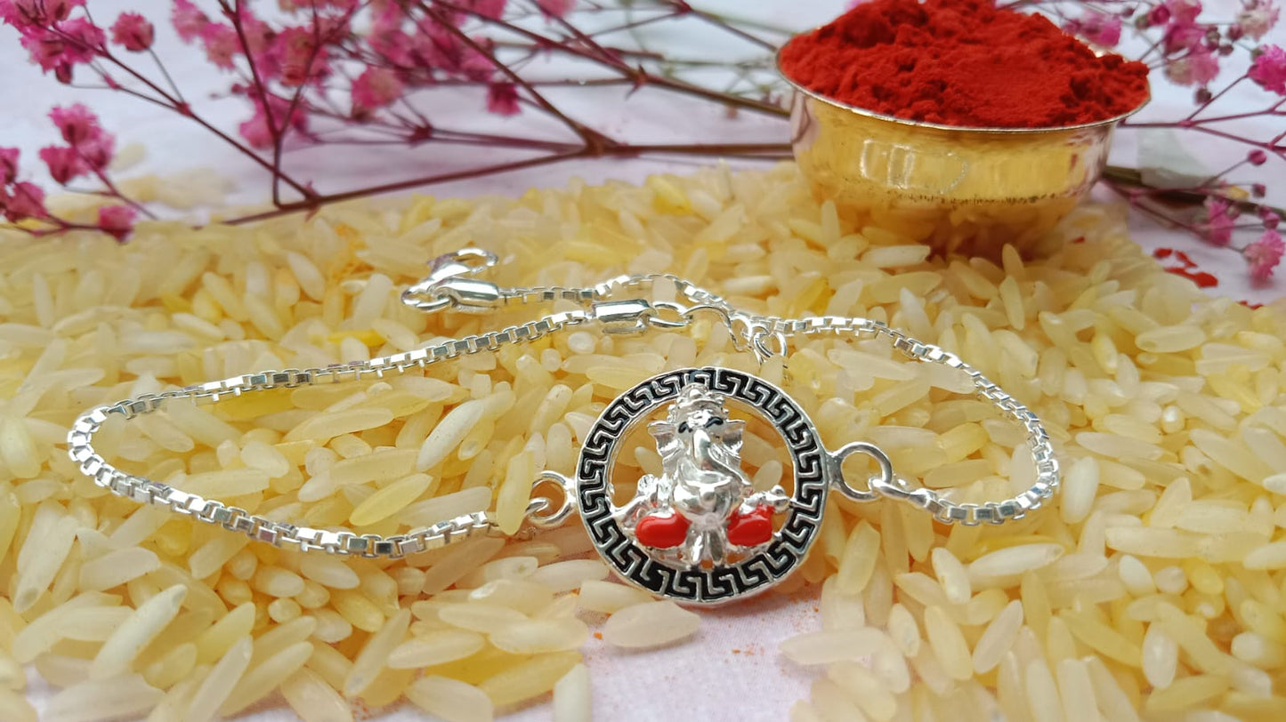 925 Silver Auspicious Ganesha ( ᬒᬁ ) Bracelet Rakhi with Pink Enamel and adjustable Silver chain