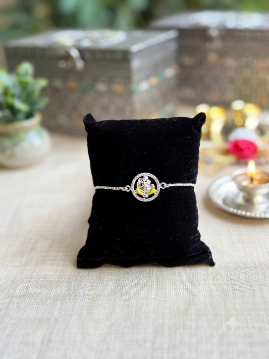 925 Silver Auspicious Ganesha ( ᬒᬁ ) Bracelet Rakhi with Yellow Enamel and adjustable Silver chain