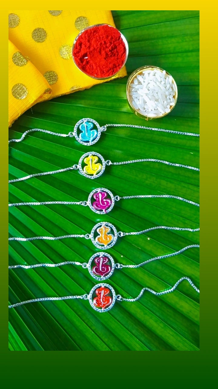 925 Silver Auspicious Ganesha ( ᬒᬁ ) Bracelet Rakhi with Saffron Enamel and adjustable Silver chain