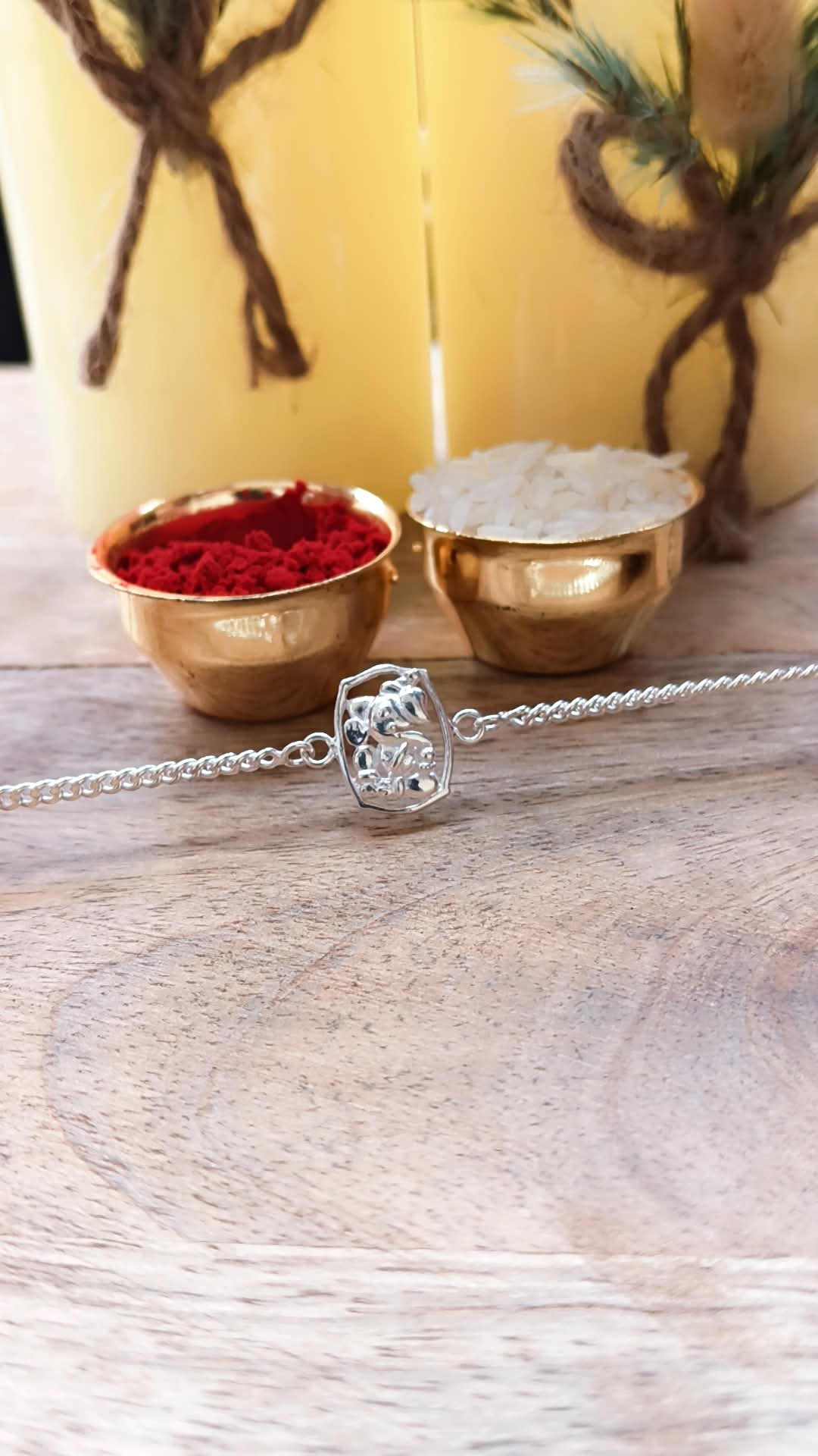 925 Silver Auspicious Ganpati ( ᬒᬁ ) Bracelet Rakhi with Pink Enamel and adjustable Silver chain