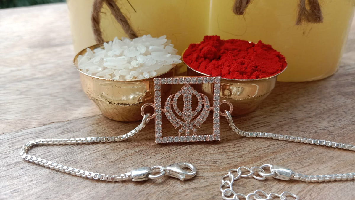 925 Silver Sacred Khanda ( ☬ ) Bracelet Rakhi with Stone-Studded Rose Gold Finish and adjustable Silver chain