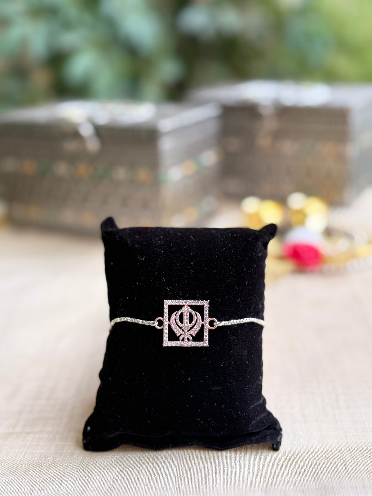 925 Silver Sacred Khanda ( ☬ ) Bracelet Rakhi with Stone-Studded Rose Gold Finish and adjustable Silver chain