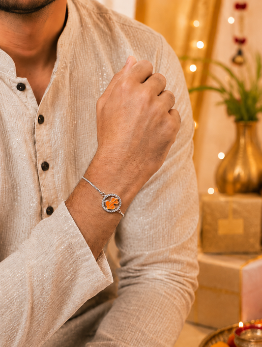 925 Silver Auspicious Ganesha ( ᬒᬁ ) Bracelet Rakhi with Saffron Enamel and adjustable Silver chain