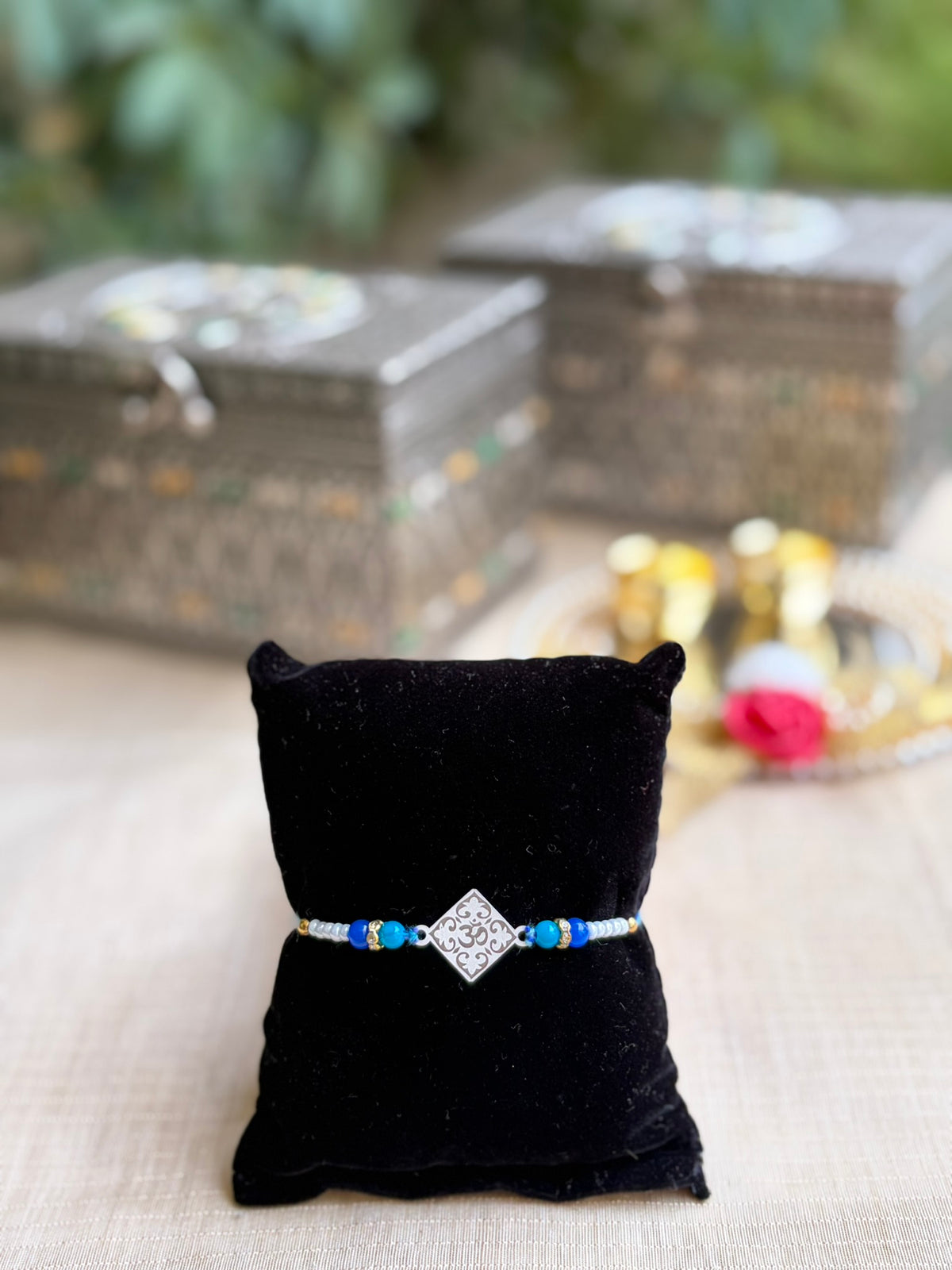 925 Silver Kids Rakhi with Om  (ॐ) Charm & Blue Beads