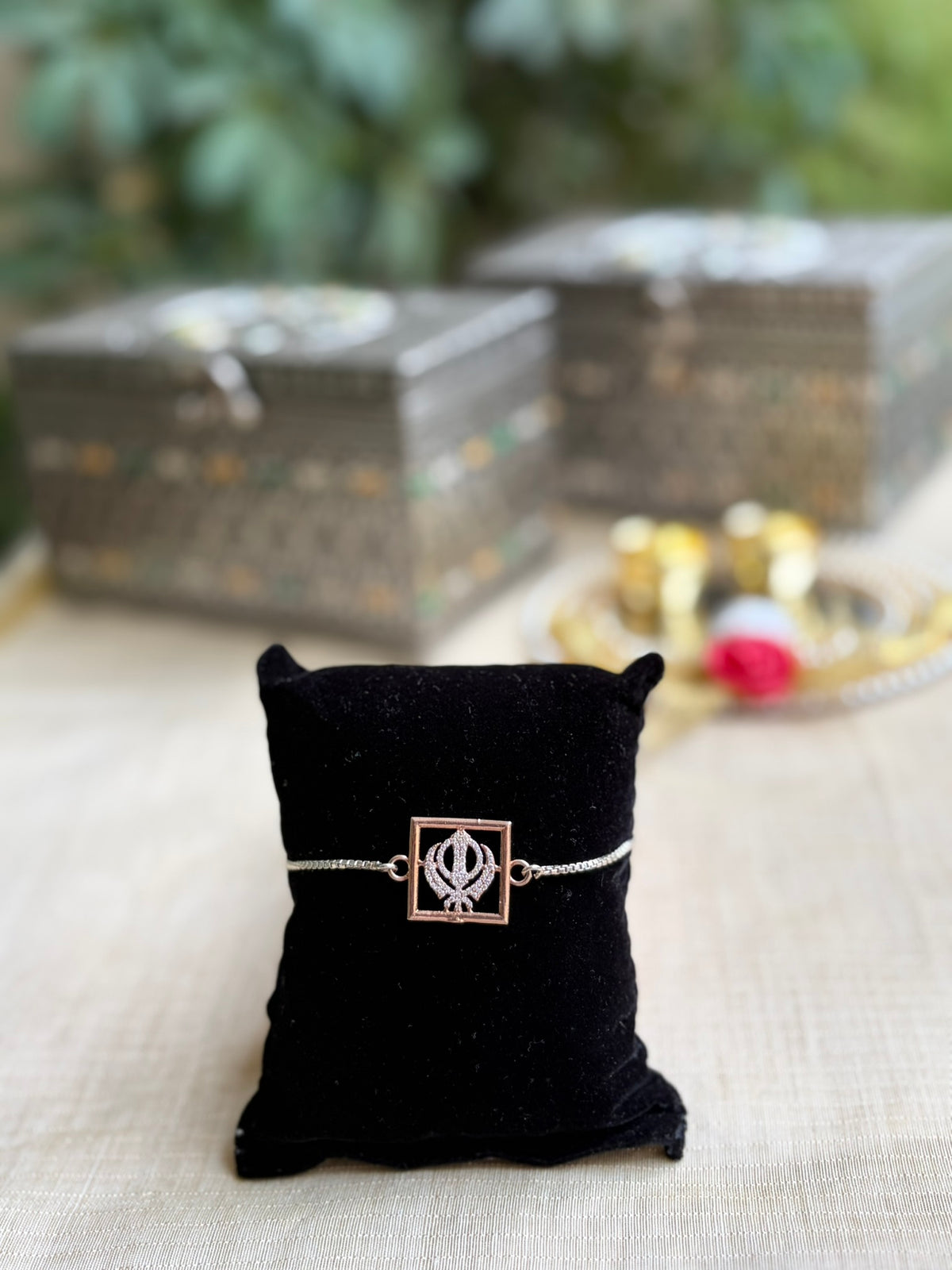 925 Silver Sacred Khanda ( ☬ ) Bracelet Rakhi with Stone-Studded Rose Gold Finish and adjustable Silver chain