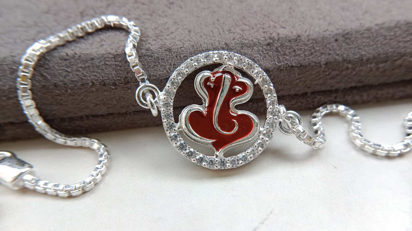925 Silver Auspicious Ganesha ( ᬒᬁ ) Bracelet Rakhi with Saffron Enamel and adjustable Silver chain