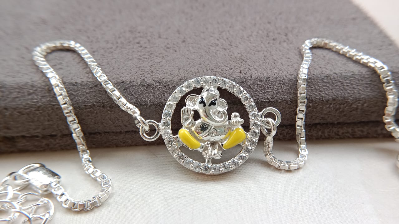 925 Silver Auspicious Ganesha ( ᬒᬁ ) Bracelet Rakhi with Yellow Enamel and adjustable Silver chain