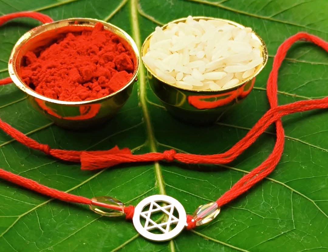 Silver Hexagram Rakhi with Red Thread