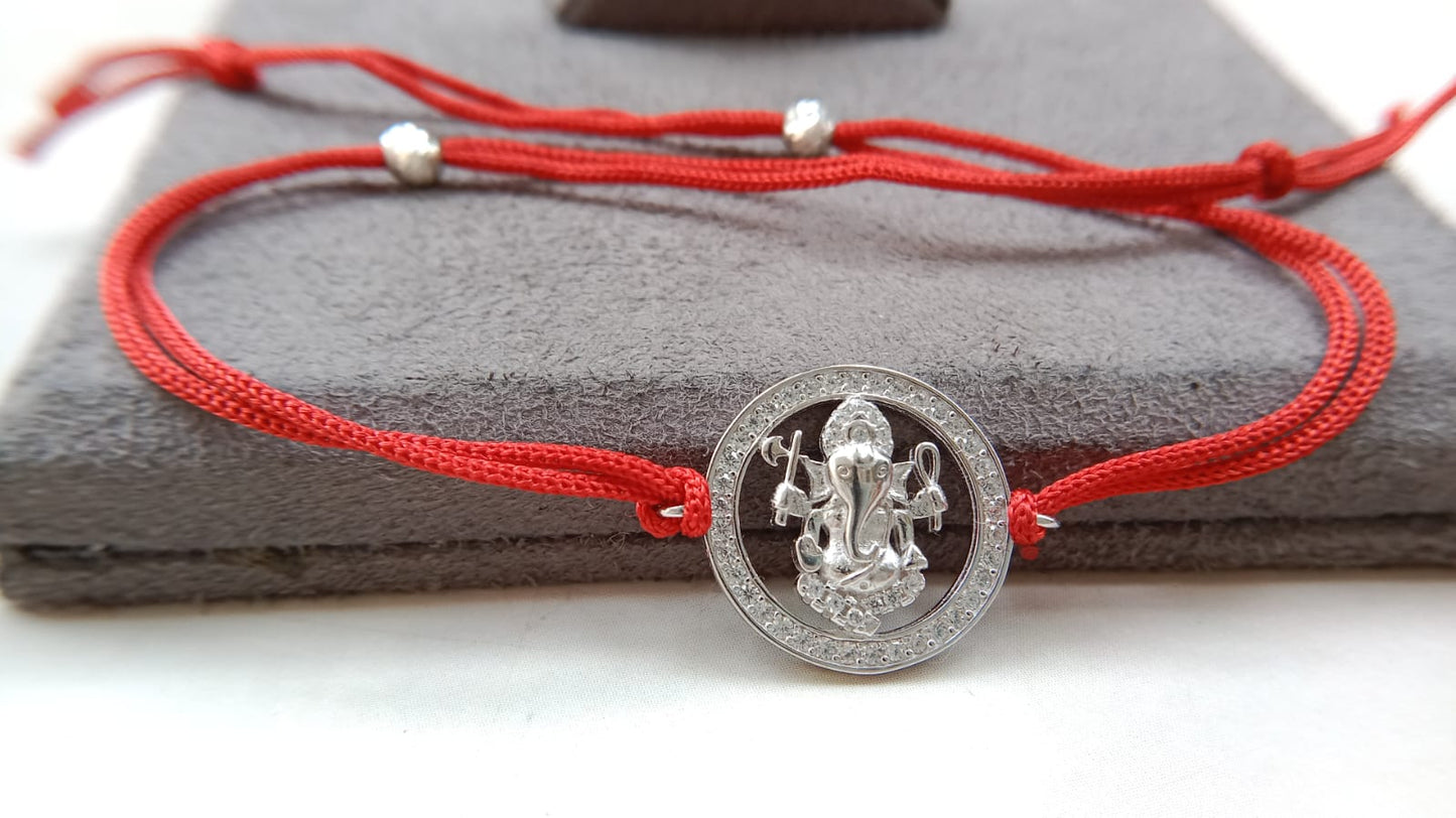 925 Silver Auspicious Ganesha ( ᬒᬁ ) Rakhi for Brother with Red Thread